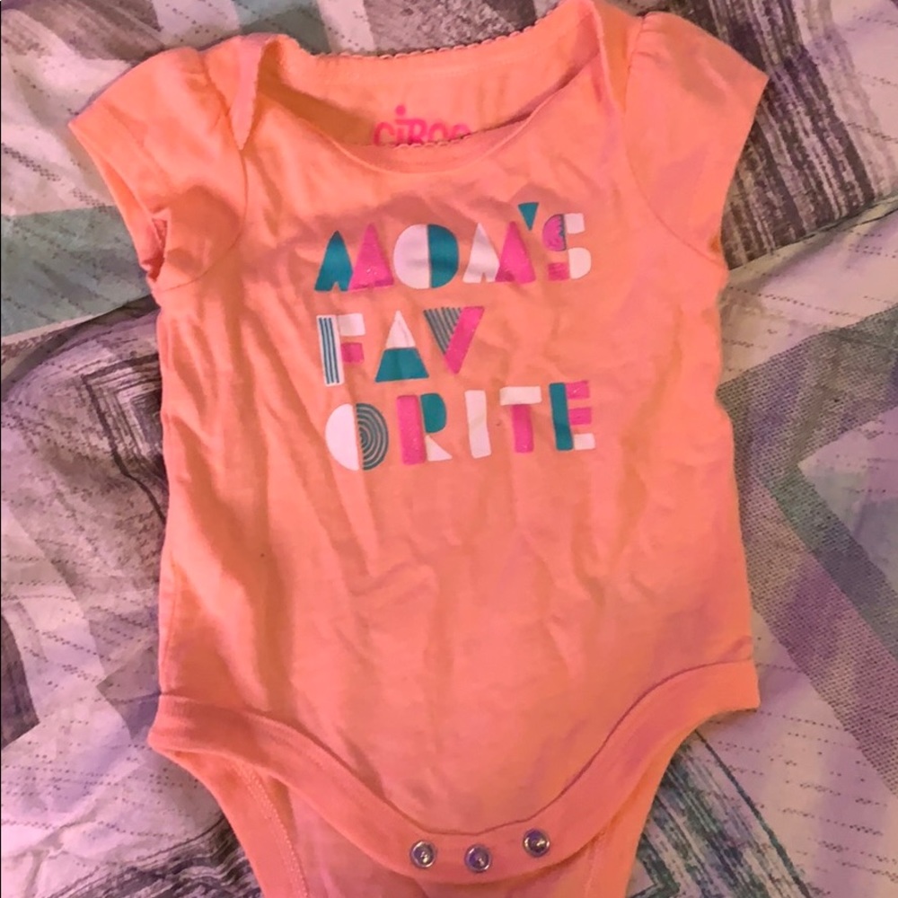 a newborn baby girl onesie